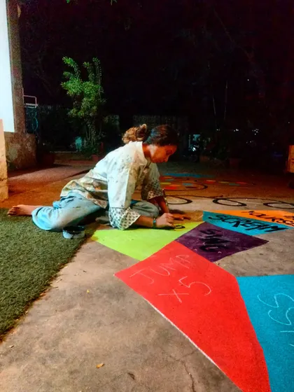 Another shot of me working late at night on the floor mural. The dedication is fueled by imagining the kids who will play here.