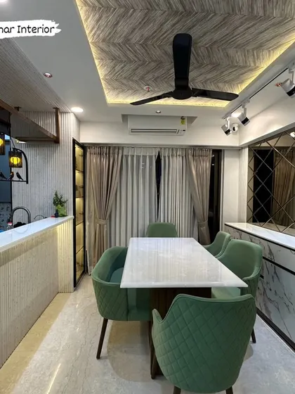 The complete dining and bar setup, showcasing how we use different materials and lighting to create a high-end restaurant feel at home.