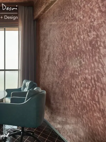 The textured wall finish in the den. I believe in going all-in with materials, covering all walls and even the ceiling to create a fully immersive experience.