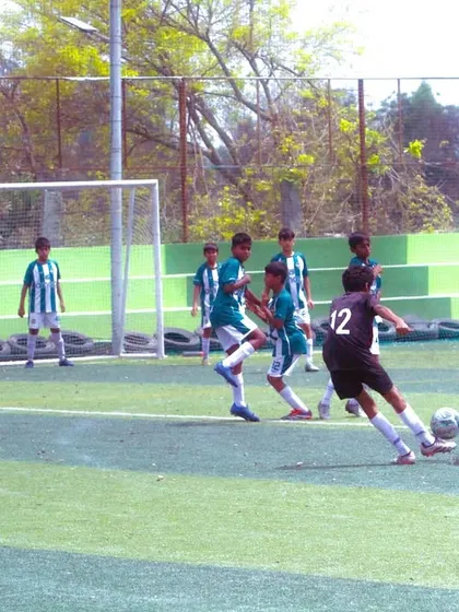 A player lines up for a free-kick during a U-13 YPL match. Moments like these test a player's nerve and skill under pressure.