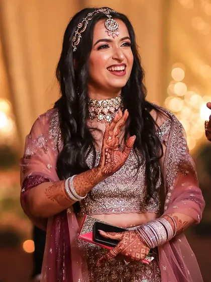 Happiness is the best makeup. My client's joyful expression is the perfect finishing touch to her party glam look.