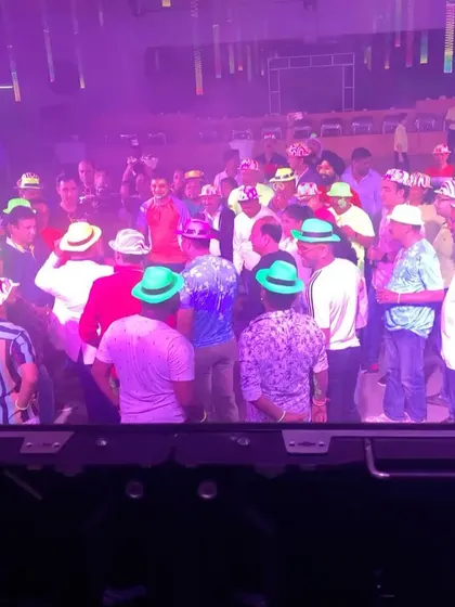 A view from the DJ booth of the themed party. Everyone got into the spirit with the hats.