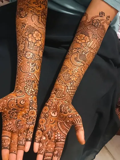 Bride Riza's full bridal henna. The design is a beautiful mix of floral and traditional patterns, creating a timeless and elegant look.