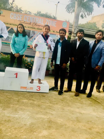 Prachi Thapa receiving her bronze medal at the CBSE Central Zone Taekwondo Championship. Consistent performance is what we strive for.