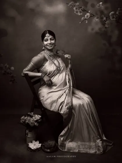A sepia-toned version of the traditional maternity portrait, giving it a vintage, heirloom feel.