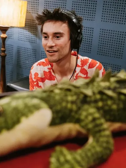 Jacob and his trusty crocodile companion in the studio. Even in moments of intense musical creation, there's always room for a bit of fun.