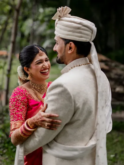 A candid moment of pure laughter and joy. We love capturing the uninhibited happiness of our couples, creating photos that are full of life and energy.