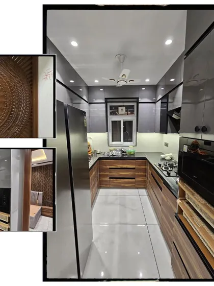 A detailed look at a completed project, showcasing a compact galley kitchen with grey and wood-finish cabinets, and a close-up of the sunburst-patterned carved wooden door.