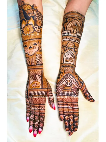 This design is rich with symbolism, featuring a bride's face, a wedding palanquin, and a dog portrait. The use of bold lines and fine details creates a stunning effect.
