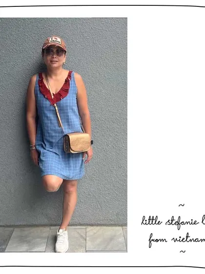 Pallavi exploring Vietnam with her Little Stefanie sling in Bronze. It's the perfect compact travel companion for hands-free exploring.