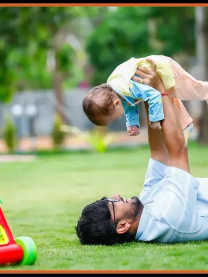 A playful and interactive moment between a father and his child during an outdoor photoshoot. We encourage natural play to capture authentic and joyful family memories.