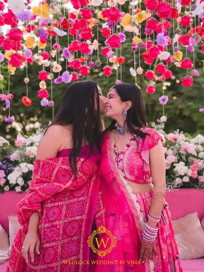 Celebrating one of our own with a vibrant Mehendi on a home terrace. The decor was filled with colorful hanging flowers and lush floral arrangements, creating a joyful setting for lots of dancing and fun.