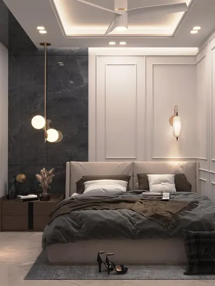 The bed area of the Munirka project render, featuring a dark marble wall behind the bed, flanked by classic white wall molding. The contrast creates a dramatic and luxurious effect.