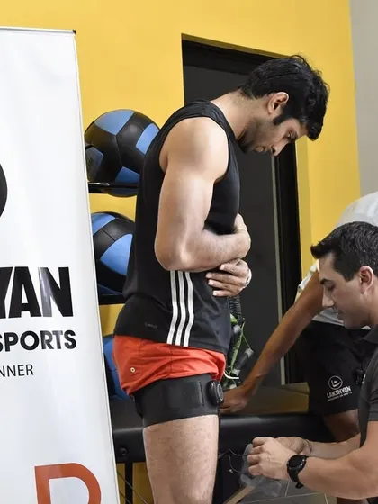 An athlete is fitted with sensors during the VALD workshop. This technology provides objective data on muscle function, which is invaluable for creating highly specific and effective training interventions.