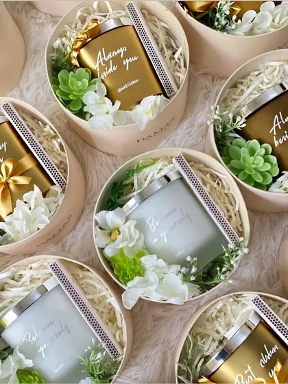 The ultimate bridesmaid gift. These round boxes contain gorgeous custom candles and can be personalized for your special friends.