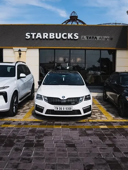 German engineering meets Czech performance. A lineup of impressive cars from BMW and Skoda parked at our Starbucks.