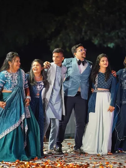 A candid moment of joy and accomplishment after a successful family performance. Our goal is to make everyone feel like a star, and this picture captures that feeling perfectly.
