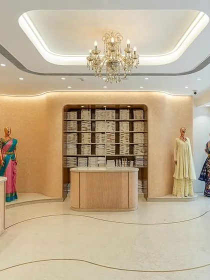 Another view of the ground floor lobby, showcasing the custom shelving and display mannequins. This floor sets the tone for the shopping experience across the five levels of the store.
