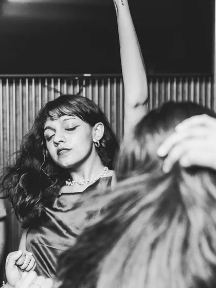 A guest lost in the music on the dance floor. This is the ultimate goal: to create a space where people can let go and just dance.