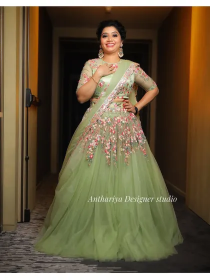An identical full-length shot, showcasing the complete look of this beautiful reception outfit.
