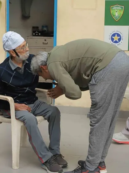 Legendary Indian cricketer Ajay Jadeja pays his respects to his coach, Shri Gurcharan Singh. It is moments like these that reinforce the deep bonds and lifelong mentorship that define our academy, inspiring our current players to walk in the footsteps of giants.