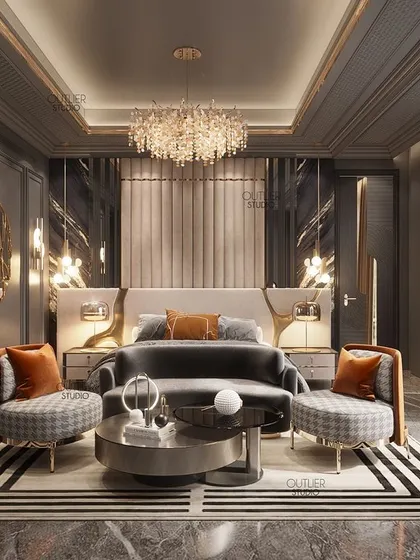 We kept this dark-themed master bedroom opulent with a tasteful touch of gold accents. The design creates a sense of serenity and comfort, with a seating area at the foot of the bed for added luxury.