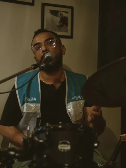 A drummer and vocalist completely in sync during a live set. We love the energy and chemistry that bands bring to our space.