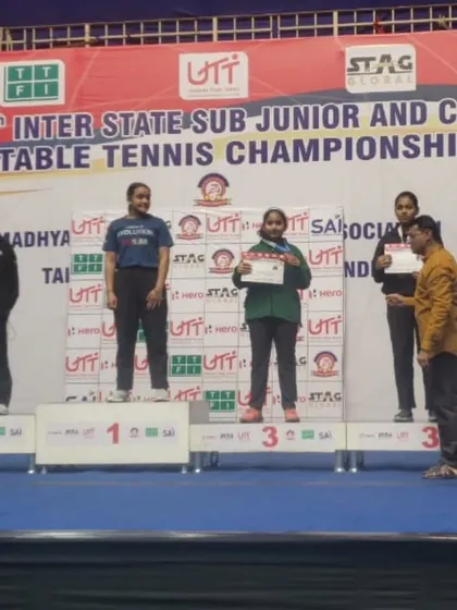 Akanksha Singhal on the podium after winning a bronze medal in the U-13 Girls Singles at the National Championship. Her individual performance against the country's best was outstanding.