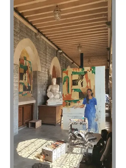 The studio setup for the large mural painting, showing the light coming in through the beautiful arched windows of the J.J. building.