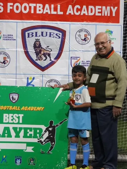 Another "Best Player" award recipient. His smile shows the pride and joy that comes with being recognized for his skills.