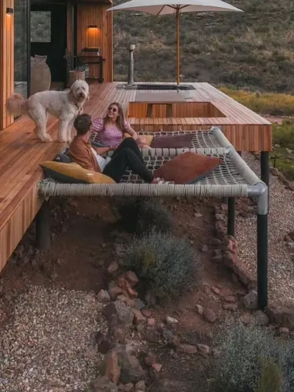 I design outdoor spaces that are an extension of the home. This deck includes a unique hammock feature, perfect for lounging and enjoying the fresh air with family and pets.