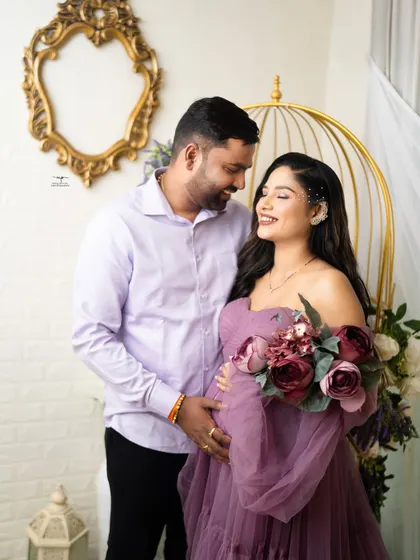 A sweet and intimate moment between the couple. Their happy smiles and gentle touch create a portrait filled with warmth and love.