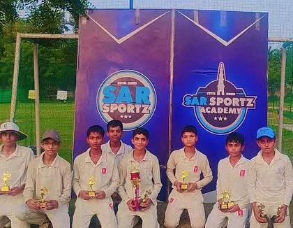 Another proud youth cricket team after their tournament victory.