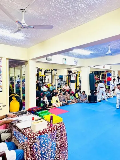 A view of the examination in progress, with parents watching from the side.