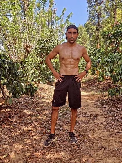 Standing in the middle of the coffee estate after a workout. The biggest lesson fitness teaches us is that we must go through pain to grow. It's a truth that applies to life as much as it does to training.