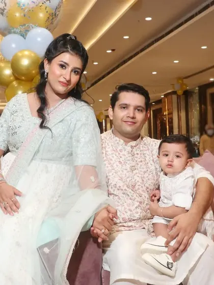 A relaxed family portrait on a comfortable sofa during an event. I find the best spots at your venue for photos.