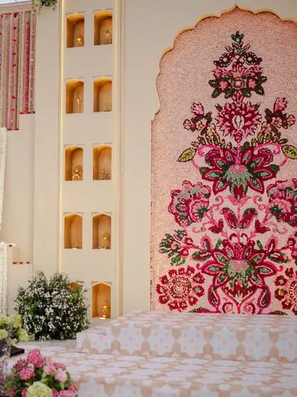 A detailed shot of the floral mosaic wall, where thousands of flower heads were used to create an intricate pattern. This is a perfect example of our commitment to floral artistry.