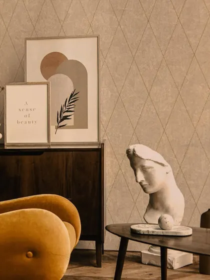 This patterned wallpaper in a warm, neutral tone features a subtle diamond grid. It's a perfect backdrop for a modern-classic interior, adding texture without overwhelming the space.