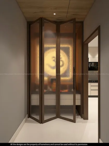 A closer look at the foldable doors of the pooja room, showing how they can close off the space for privacy.
