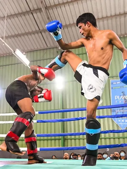 A powerful demonstration of technique from our coach Vinod during a WKN kickboxing tournament. This high kick shows the flexibility, power, and precision that our students learn to develop through our specialized training programs.