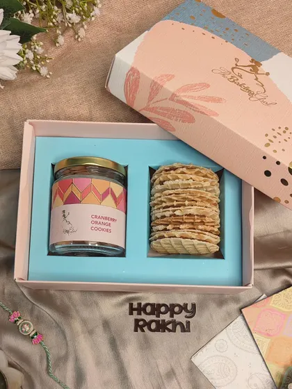 A light and delightful combination. This hamper pairs a jar of my zesty Cranberry Orange cookies with eight crispy, Nutella-filled waffles.