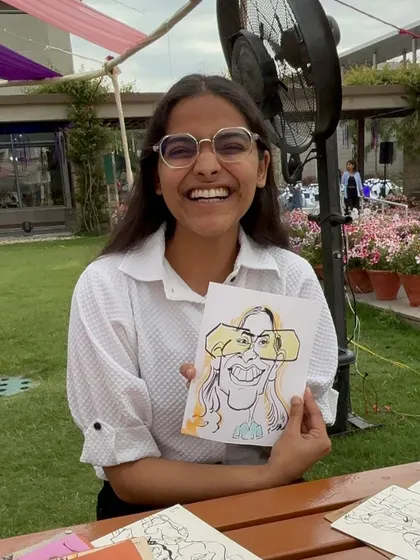 Her joyous laugh is the best feedback. So happy she loves her caricature.