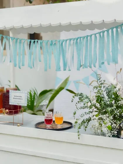 My charming refreshment cart, serving traditional Indian drinks like Kokam Kala Khatta and Iced Tea. It's a beautiful addition to any outdoor wedding or event.