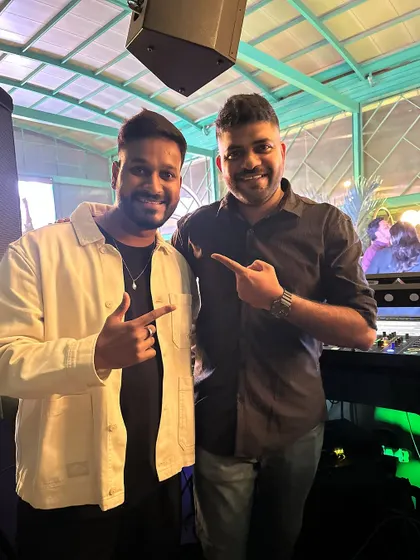 Posing with a fellow attendee at the Roto launch party.