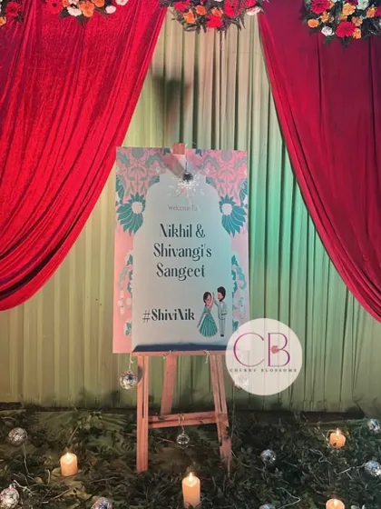 A personalized welcome easel for a Sangeet and Cocktail night. We designed this welcome sign with a custom caricature of the couple, setting a fun and personal tone right from the entrance.