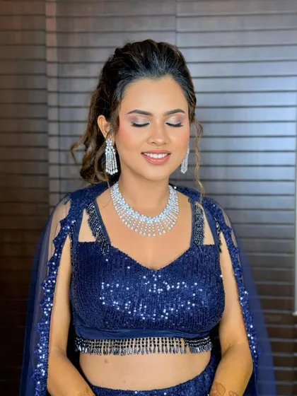 My gorgeous bride Sayeri, glowing for her Sangeet. The soft, shimmery eye makeup and romantic hairstyle are perfect for a night of celebration.
