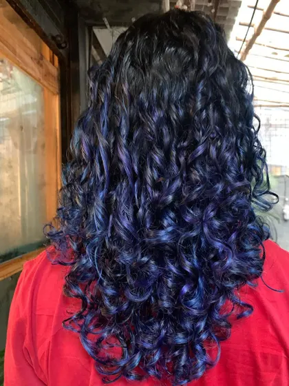 Rocking this blue purple hair like a bossman. A magical transformation for these curly locks. This is a bleach color. (No filter)