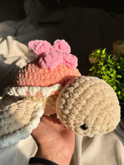 This view showcases the soft, rounded shell of our butterfly turtle. It's designed to be as cute as it is cuddly.