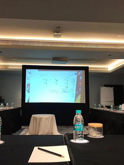 This setup for a smaller corporate meeting or seminar demonstrates my versatility. I provide complete AV solutions, including projectors, screens, and sound systems, for intimate and focused business gatherings.