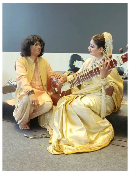 A candid moment with a student during our Sitar Symphony concert in Hyderabad. These interactions backstage are a cherished part of our musical journey together.